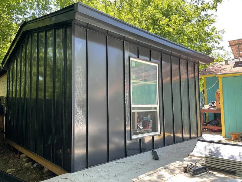 Black standing seam metal wall panels for Roof Inspection in Lower Paxton